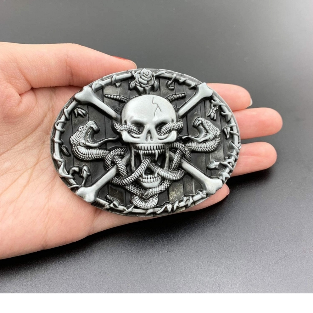 New skull and crossbones snake belt buckle approximately 3 inch wide